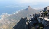 The panoramic view out over Cape Town keeps abseilers company as they get ready to begin their descent. Photo credit: Nic Bradley