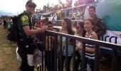 Chris handing out autographs in Cali