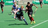 Eastern Province's Dalan Phillips (right) and Brad Logan race for the ball during defending champs Tuffy Western Province's 6-1 win in the Greenfields Men's Interprovincial at Queensmead in Durban Thursday.