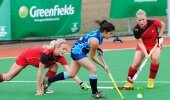 Caitlyn du Preez drives towards the strike zone as Border's SA defender Marcelle Manson (left) and Marlies van der Stel try to stop her during Northern Blues' 6-1 win at the SA Interprovincial Tournament on Greenfields Turf in Pietermaritzburg Thursday.