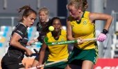 Celia Evans v Germany yesterday, with Illse Davids in background.