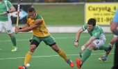 South Africa's Keenan Horne shapes to shoot as Ireland captain John Jackson tries to block during the second and final Test against Ireland at Hartleyvale in Cape Town Monday night. 