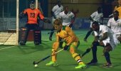 SA captain and midfielder Tim Drummond in possession as defender Charles Abbiw of Ghana challenges during the Greenfields Africa Hockey Championship match at Randburg Hockey Stadium Tuesday night. SA won 4-0.