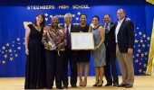 Symphonia for South Africa & Partners for Possibility receiving the Reconciliation Award ‘for enlivening reconciliation by helping to bridge the social, economic and geographic divides between the business and education sectors’.