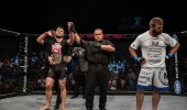 A jubilant Cyril Asker (left) after beating Andrew van Zyl (right) to become the new EFC heavyweight champion