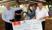 Celebrating the handover of R40 000 from the Vodacom Durban July to the KZN Chapter of the SA Riding for the Disabled Association (SARDA) are (from left) Alberts Breed, Vodacom Managing Executive KZN, Linda Wilson, Alulutho Tshoba riding Spirit, Eric Major and Ken Tweddell Event Marketing Manager, Gold Circle.