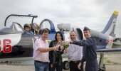 Celebrating Baywest Mall’s sponsorship of the renowned Port Elizabeth air show, now named the Baywest Port Elizabeth Airshow, are (from right) SA Air Force spokesman and museum curator Captain Mark Kelbrick, Baywest MD Gavin Blows, MTR Smit Children’s Haven director and air show convenor Crystal Watson, and air show committee members Andrew Barton and Stu Davidson (in the cockpit of his L39 fighter jet). 