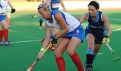  WP midfielder Tarryn Bright in possession as Northern Blues defender Kim Hubach closes in during the SA Women's Interprovincial Tournament final on Greenfields Turf in Pietermaritzburg Saturday. 
