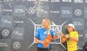 Caption: Stephanie Gilmore celebrates her win at the Cascais Women's Pro. Image: ASP / Masurel