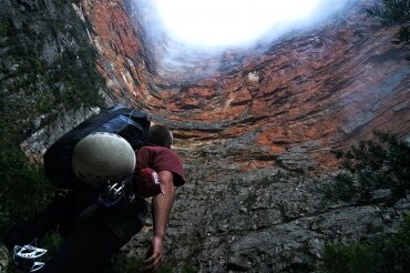 Looking up from the base of the wall, the scale of the adventure ahead becomes blatantly apparent. A healthy apprehension begins to cloud our enthusiasm.