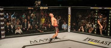 Potts celebrates after retaking the EFC AFRICA heavyweight title