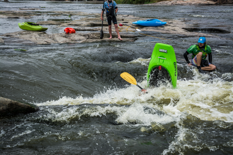 Beginner kayakers often perform moves by mistake, a crowd favourite. Can they roll and get back in the wave?