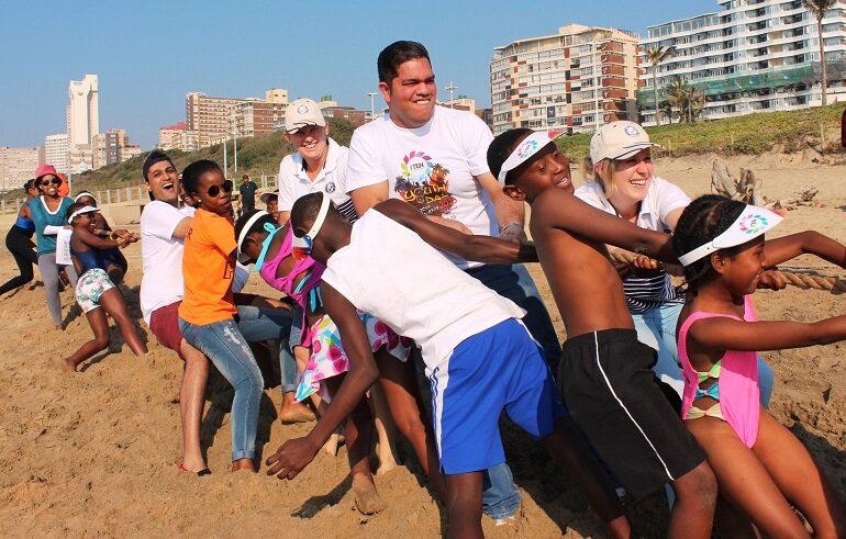 Kapil Premchand, Linda Morrison, Masood Boomgaard and Kelly Taylor having fun with the orphans