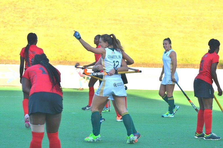 Goalscorer Dirkie Chamberlain (12) is embraced by SA captain Nicolene Terblanche (obscured) as Jade Mayne (27) looks on during the Greenfields Africa Hockey Championships match against Kenya at Randburg Hockey Stadium Thursday. Goalscorer Dirkie Chamberlain (12) is embraced by SA captain Nicolene Terblanche (obscured) as Jade Mayne (27) looks on during the Greenfields Africa Hockey Championships match against Kenya at Randburg Hockey Stadium Thursday.