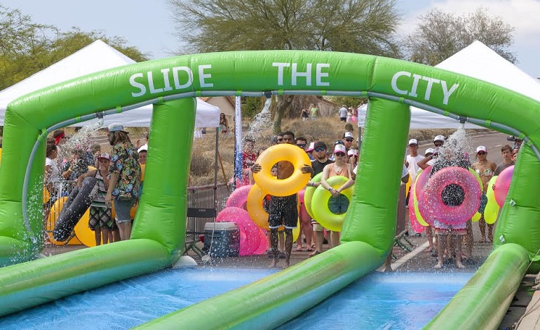 Slide the City is one of the longest commercial waterslides in the world. Slide the City is one of the longest commercial waterslides in the world.