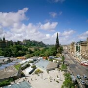 Edinburgh city on a beautiful summers day, with the park and castle in the background.